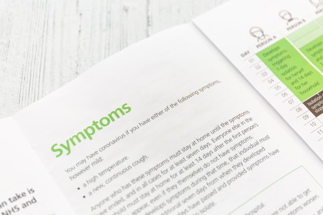 white printer paper on brown wooden table